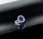 Bespoke Order Sapphire & Diamond Cluster Ring. Initial Deposit - Pobjoy Diamonds