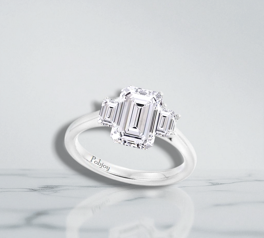 18K White Gold 2.00 Carat Emerald Cut Lab Diamond Trilogy Ring - E/VS1 - Pobjoy Diamonds