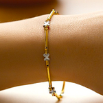 Ladies 9K Yellow & White Gold Kiss Bracelet - Pobjoy Diamonds
