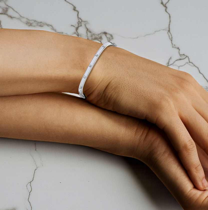 White Gold Ladies Studded Diamond Oval Bangle 0.20 Carat - Pobjoy Diamonds