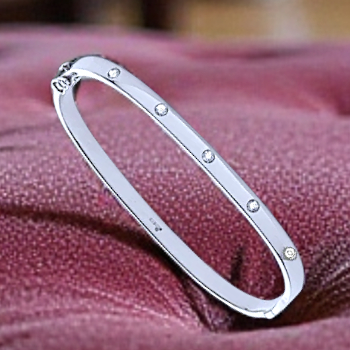 White Gold Ladies Studded Diamond Oval Bangle 0.20 Carat - Pobjoy Diamonds