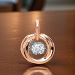 9K Rose Gold 0.10 Carat Dancing Diamond Pendant - Pobjoy Diamonds