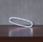 White Gold Ladies Studded Diamond Oval Bangle 0.20 Carat - Pobjoy Diamonds