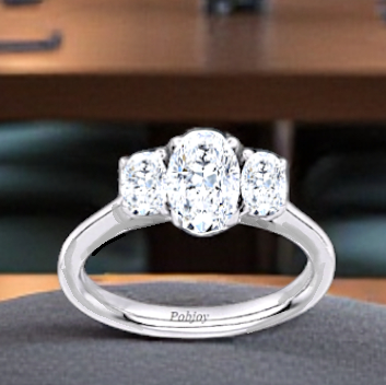 Oval Diamond Trilogy Ring Custom. Pobjoy Diamonds