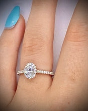 Load image into Gallery viewer, Oval Cut 0.55 CTW Diamond Halo Engagement Ring D-E/VS Grade - Pobjoy Diamonds
