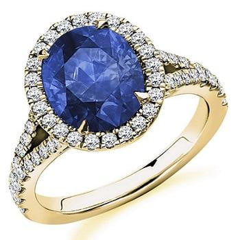 18K Yellow Gold Oval Cut Blue Sapphire & Diamond Halo Ring - 4.85 CTW - Pobjoy Diamonds