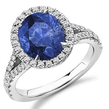 18K White Gold Oval Cut Blue Sapphire & Diamond Halo Ring - 4.85 CTW - Pobjoy Diamonds