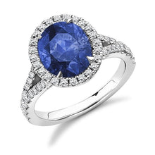 Load image into Gallery viewer, 18K White Gold Oval Cut Blue Sapphire &amp; Diamond Halo Ring - 4.85 CTW - Pobjoy Diamonds