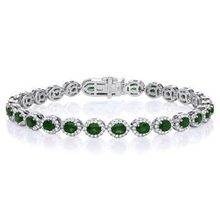Load image into Gallery viewer, 18K Gold 5.50 Carat Oval Emerald &amp; Diamond Tennis Bracelet - Pobjoy Diamonds