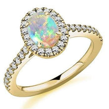 Load image into Gallery viewer, 18K Yellow Gold Oval Opal &amp; Diamond Halo Ring 0.85 CTW - Pobjoy Diamonds