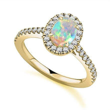 Load image into Gallery viewer, 18K Yellow Gold Oval Opal &amp; Diamond Halo Ring 0.85 CTW - Pobjoy Diamonds