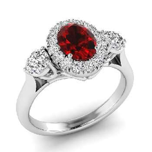 Load image into Gallery viewer, Platinum Oval Red Ruby &amp; Diamond Trilogy Ring - Pobjoy Diamonds
